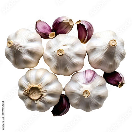 A top down view of several heads of garlic and some garlic cloves on a black background surface