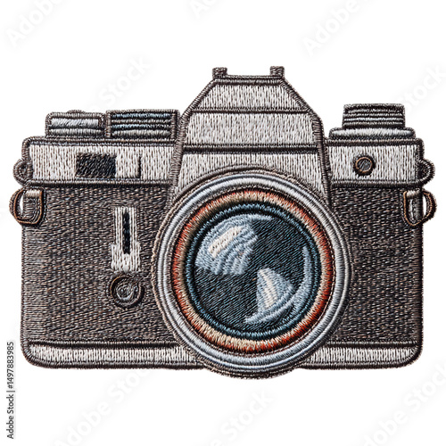 Vintage camera embroidery patch shows detailed stitched design of classic camera with lens and buttons in soft colors