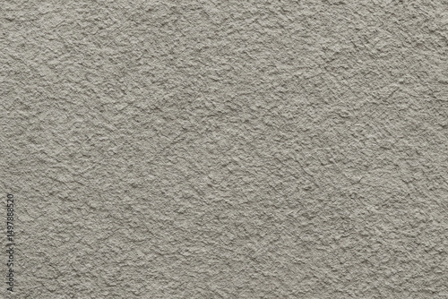 Obraz na płótnie A close-up texture of a light gray plaster wall, showcasing intricate patterns and a rough surface. Ideal for background use in architectural or design projects. w salonie