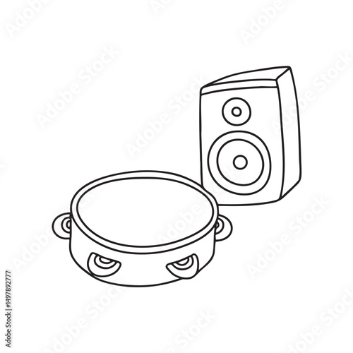 A tambourine resting near a speaker