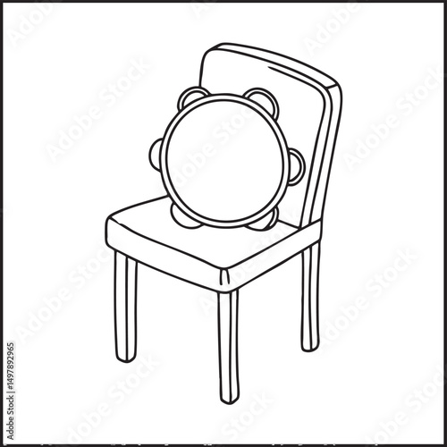 A tambourine resting on top a chair