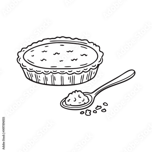 A tart beside a spoon with crumbs on the edge