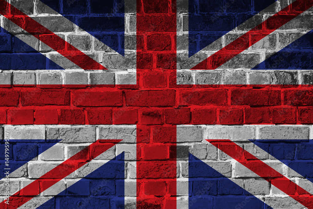 Fototapeta premium Big national flag of great britain on a massive old brick wall.