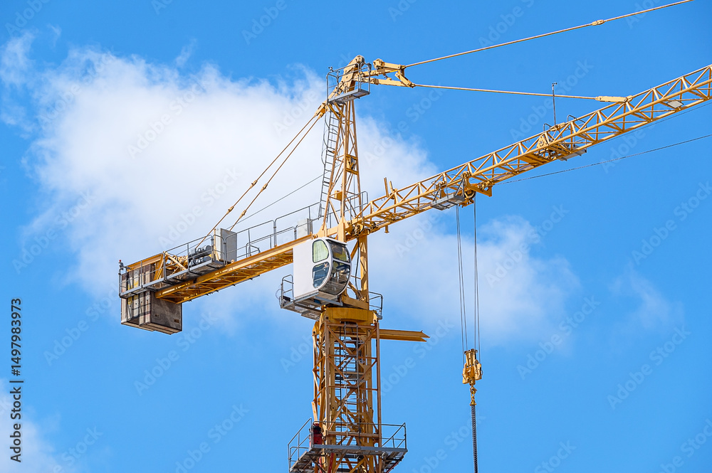 part of yellow construction crane part of yellow construction crane