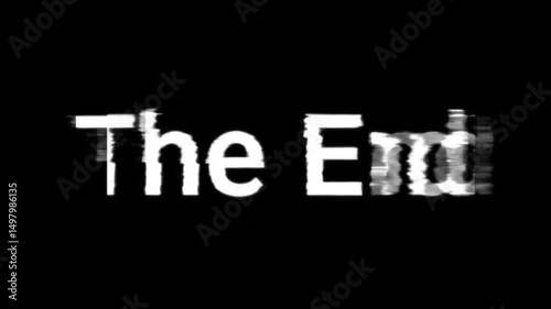 The end text with glitch effect on black background in white color with digital distortion