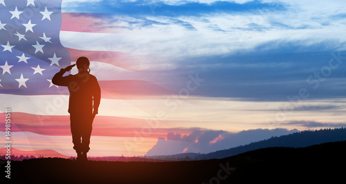 Silhouette of soldier saluting on background of USA flag. Greeting card for Veterans Day, Memorial Day.
