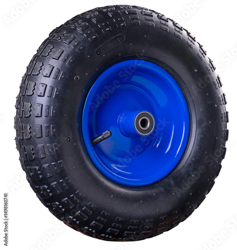 New shiny wheel used in garden wheelbarrows. Isolated background.	