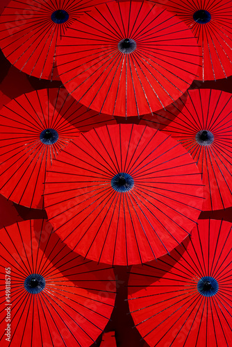 Red paper parasols on display, Arashiyama, Kyoto, Japan