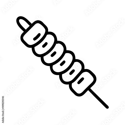 A skewer with several white marshmallows stacked on top of each other in a diagonal line design style