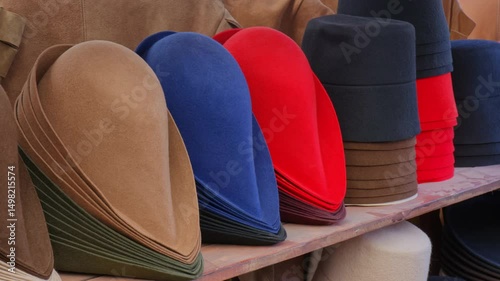 Display of reproductions of 17th century felt hats at a historical reenactment