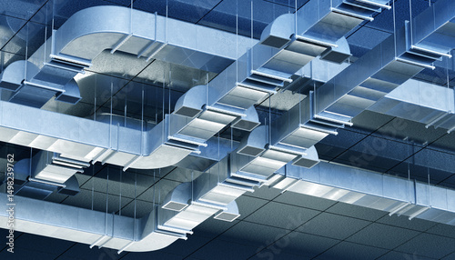 Modern HVAC ductwork system on a commercial ceiling, used for air ventilation and climate control in buildings. HVAC. Construction. Building infrastructure.