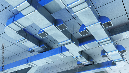 Modern air ventilation ducts on a suspended ceiling in an industrial or commercial facility, used for HVAC air distribution. HVAC. Construction. Infrastructure.