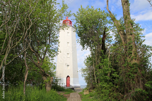 Landscape with lighthouse on the beach