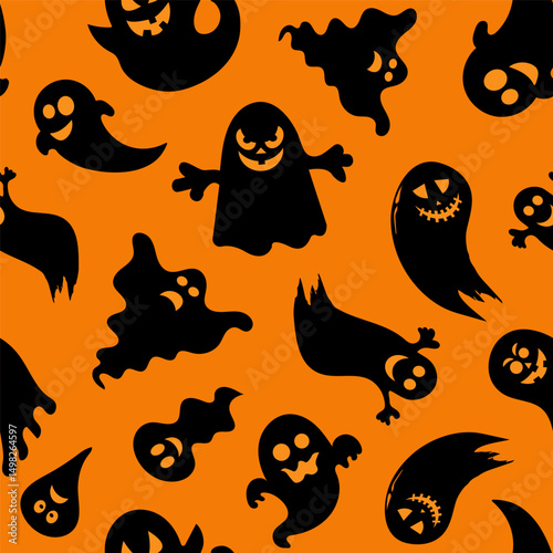 Spooky black ghost silhouettes on bright orange background for Halloween celebration decorations