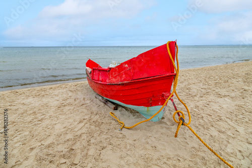 old wooden fishermens ship at the beach