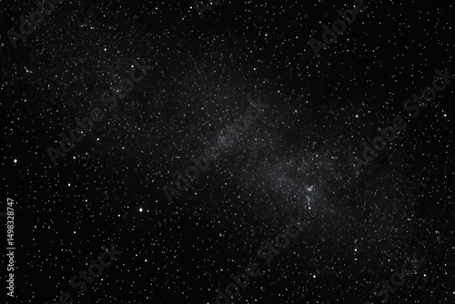 Vast dark night sky filled with countless bright stars and scattered clusters creating a serene and infinite cosmic view