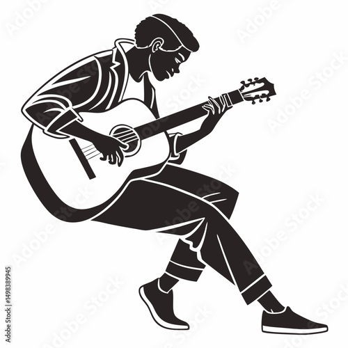 Young man playing acoustic guitar silhouette