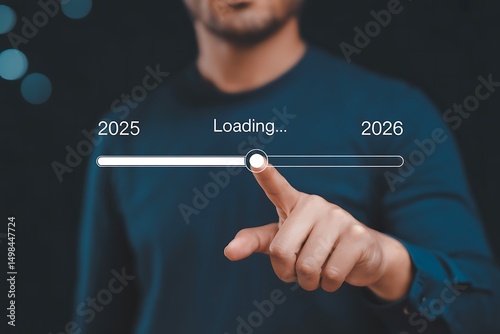 Loading progress bar of 2025 to 2026 with a finger pointing at the future