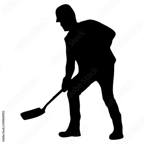 Silhouette of a Man Shoveling