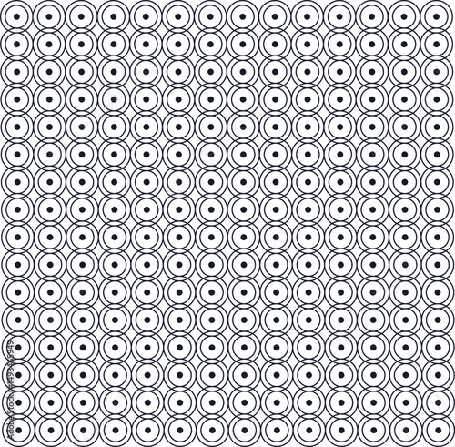 The pattern or texture consists of round geometric shapes with dots in the form of a dense surface.