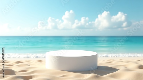 White podium on a sandy beach with turquoise sea and blue sky