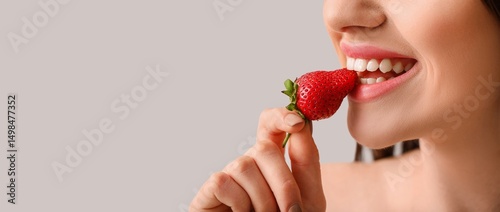 Sexy young woman with straw...