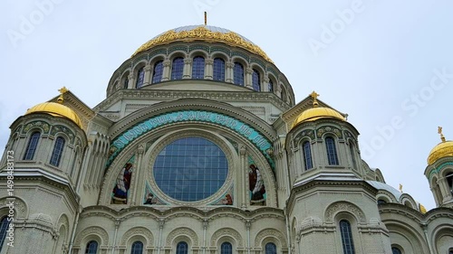 KRONSTADT, Russia - September 14, 2024: St. Nicholas Naval Cathedral. The Kronstadt Naval Cathedral on Yakornaya Square in cloudy weather in autumn. Autumn Kronstadt. Kotlin Island. 4K photo