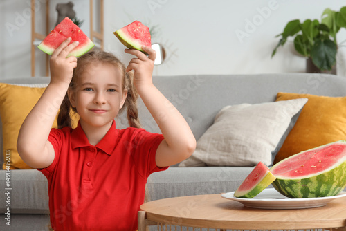 Little girl with fresh wate...