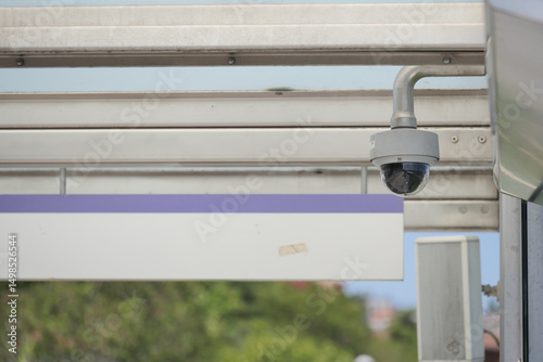 Fototapeta Naklejka Na Ścianę i Meble -  Security camera installed at public transport station