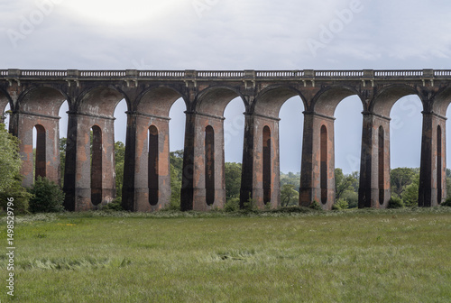 Architectural splendour of Ouse Valley Viaduct or Balcombe with sky background, carries the Brighton Main Line over the River Ouse in Sussex, has been described as the most elegant viaduct in Britain. photo