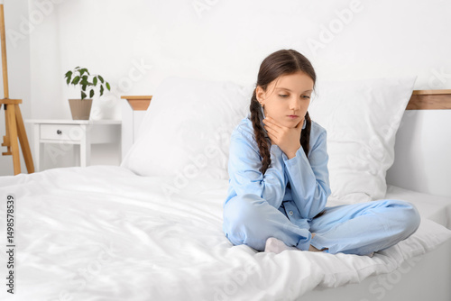 Cute girl suffering from so...