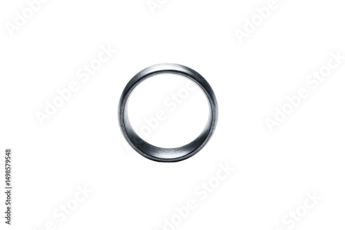 Silver metal ring with circular design on black background, cut out