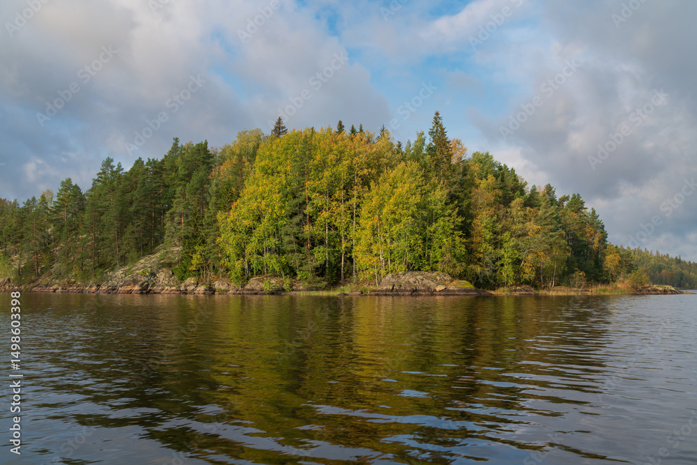 Fototapeta premium Lake Ladoga near the village Lumivaara on a sunny autumn day, Ladoga skerries, Lakhdenpokhya, Republic of Karelia, Russia