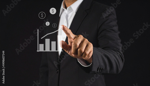 A man in a suit points to a virtual graph with increasing bars and dollar signs, symbolizing financial growth and business success.