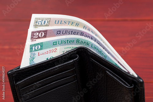 Irish money - pound in the black wallet photo