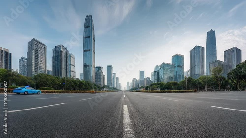 Expansive empty plaza paving opening onto hangzhou skyline with majestic cable-stayed bridge spanning the qiantang river and modern glass high-rises under a clear blue sky in china’s urban landscape