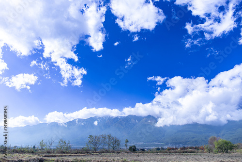 Fototapeta Naklejka Na Ścianę i Meble -  mountain landscape with blue sky and scattered clouds