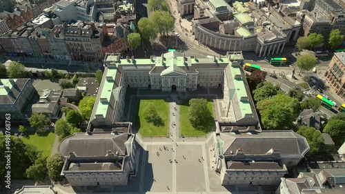 Reversing overhead aerial video of the campus and surrounding areas of Trinity College in Dublin, Ireland on a sunny day. Filmed in 4K, 60FPS and with Rec709 color. photo