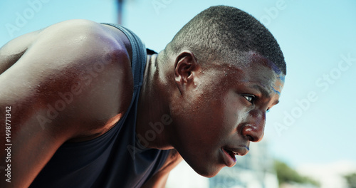 Foto Runner, black man and tired with sweating at stadium for race competition, endurance challenge and breathing