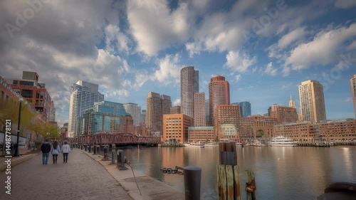 Boston downtown financial district skyline with modern skyscrapers and historic architecture under clear blue sky
