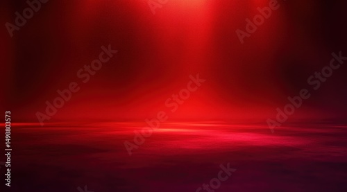 Empty red textured stage with soft spotlight creating a dramatic atmospheric glow photo