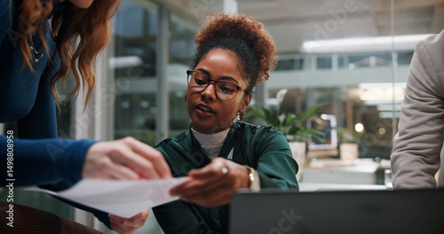 Woman, document and meeting in office for business, project feedback and review advice at night. Journalist team, paper and tech in agency for article discussion, collaboration and late information