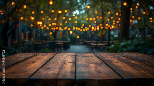 Rustic Wooden Table at Night with Warm String Lights photo