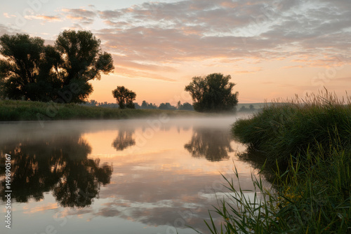 serene summer dawn over tranquil pond sky reflecting perfectly on waters surface