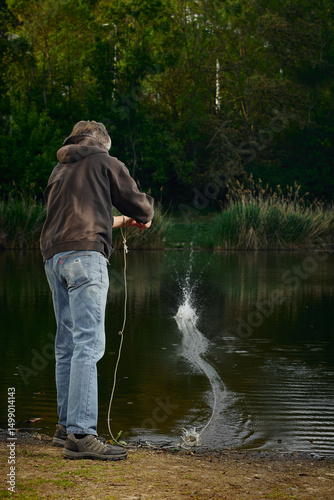 Senior citizen fishing with magnet in city lake found guns