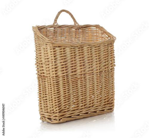 One empty wicker basket isolated on white