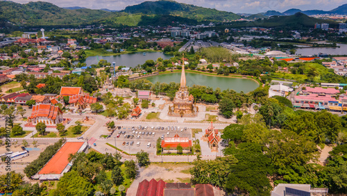 A drone aerial view of Wat Chalong is the most important temple of Phuket, Thailand.  and 1 of 5 must come in the afternoon