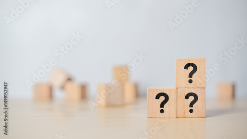 Wallpaper Mural Question mark symbol on wooden cube placed on table. Idea of asking, doubt, problem solving, and curiosity. Torontodigital.ca