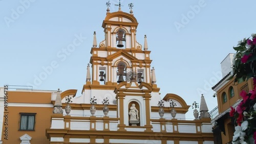 Static shot of the central architectural ensemble, highlighting ornamental columns, Baroque symmetry, and color contrasts that capture classic Andalusian style