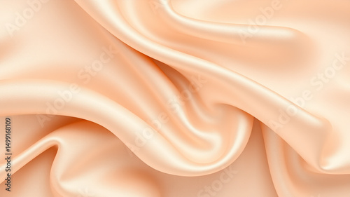 Luxurious peach silk fabric draped softly elegant texture background